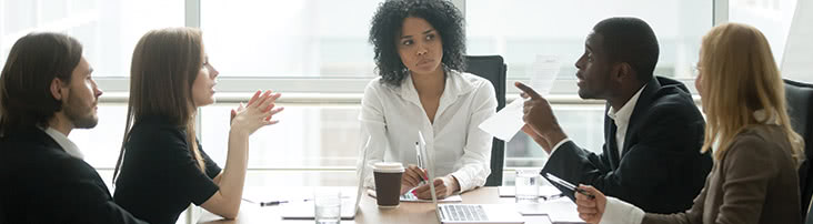 Five people in a meeting