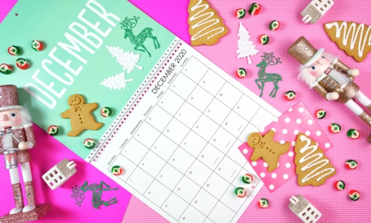 December 2020 calendar with nutcracker, Christmas cookies and other decor.