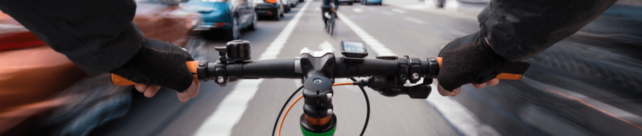 A cyclist riding in a bike lane.