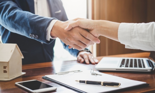 two people shaking hands