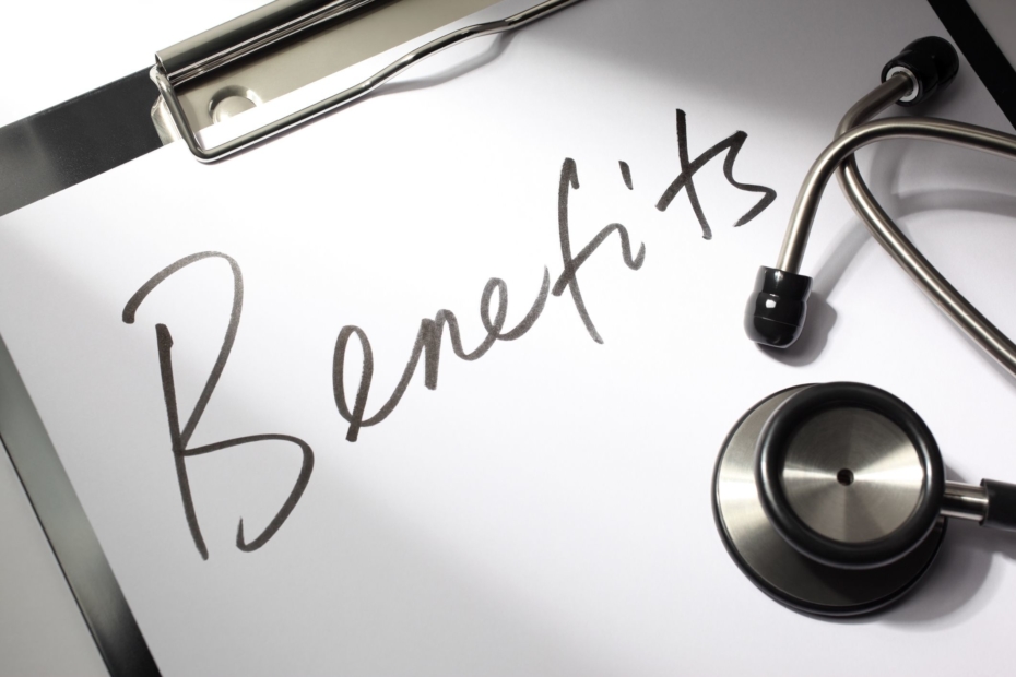 "Benefits" written on a doctor's clipboard with stethoscope.