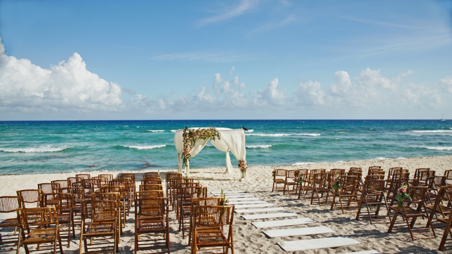 Destination wedding white sand Mexico with the ocean in the background foreign marriages